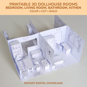 Puede incluir: Una casa de muñecas 3D de papel blanco con varias habitaciones, incluyendo un dormitorio, sala de estar, baño y cocina. El texto en la imagen dice "PRINTABLE 3D DOLLHOUSE ROOMS" y "INSTANT DIGITAL DOWNLOAD". Las habitaciones están amuebladas.