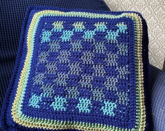 Hand crocheted checker board throw pillow and game with marble checkers in ocean blues and greens