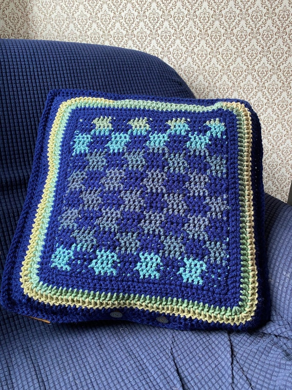 Hand crocheted checker board throw pillow and game with marble checkers in ocean blues and greens