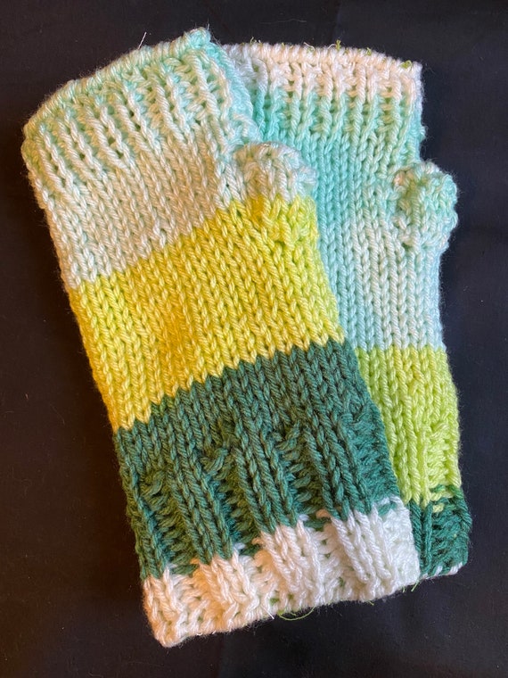 Shades of green and teal hand knit and lined fingerless gloves