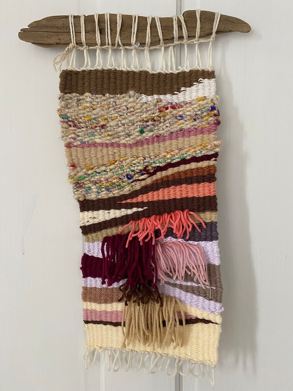 Woven wall hanging: recycled scrap yarn in neutral, rose, winter desert colors with drift wood hanger