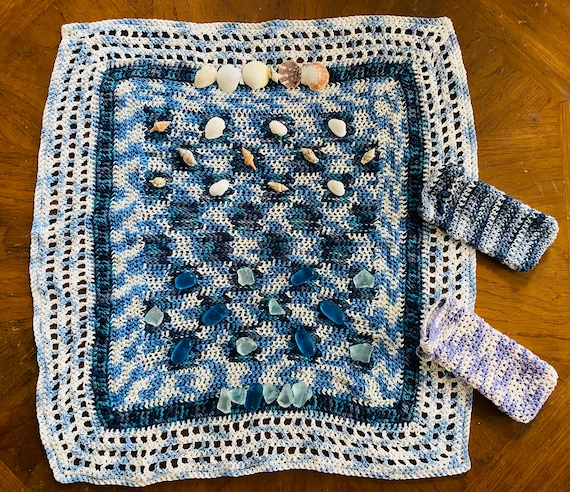 Hand crocheted checker board table cloths with sea glass and shell checker pieces