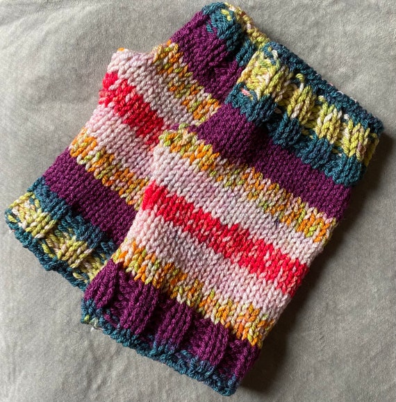 Colorful striped hand knit fingerless gloves lined with fun mushroom print flannel cotton