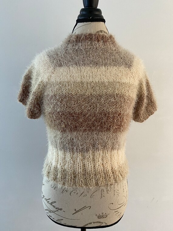 Feather light and baby soft neutral shortsleeved hand knit pullover sweater