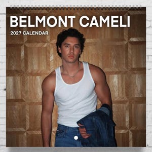 May include: A 2027 wall calendar featuring a portrait of Belmont Cameli. The calendar displays the text BELMONT CAMELI 2027 CALENDAR at the top. The image shows a person wearing a white tank top and blue jeans, holding a dark denim jacket.