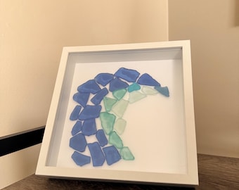 Sztuka z motywem fal morskich – oprawiona w ramę ścienną 8x8