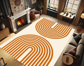 May include: A white and orange geometric rug with a modern design featuring two large, overlapping arches with stripes. The rug is laid out on a wooden floor in a living room setting.