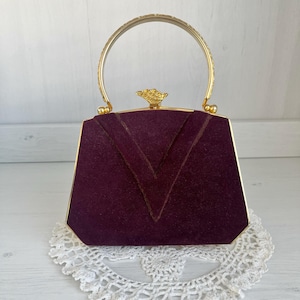 Sac vintage en velours violet foncé avec poignée sur le dessus, petit sac à main rétro en métal doré
