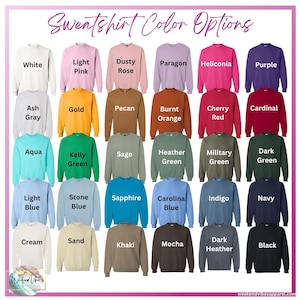 A display of sweatshirt color options, including white, pink, and purple. Other colors include gold, green, and blue. The text "Sweatshirt Color Options" is at the top. The website address "weekendvibesapparel.com" is at the bottom.