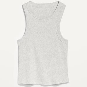 May include: A light grey ribbed vest top with a scoop neckline and wide shoulder straps. The sleeveless top is made of a soft, textured fabric and has a rounded hemline. The casual top is suitable for layering or wearing on its own.