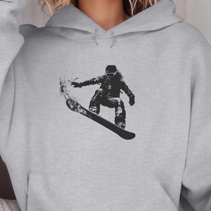 Snowboarder Graphic Hoodie: Winter Sports Sweatshirt
