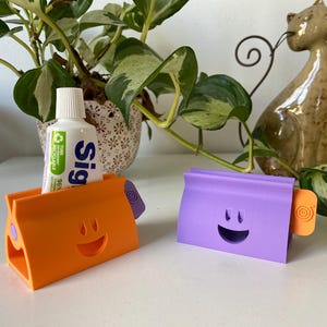 2er Pack Squeeze-me – 3D-Zahnpastatubenausdrücker | Farben zur Auswahl | Null Abfall