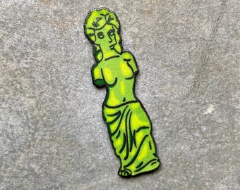 Pin pirata de Venus de Milo de goma, botón de Bart Simpson