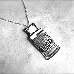 bayer heroin bottle necklace with silver plated chain