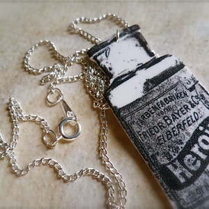 bayer heroin bottle necklace with silver plated chain image 2