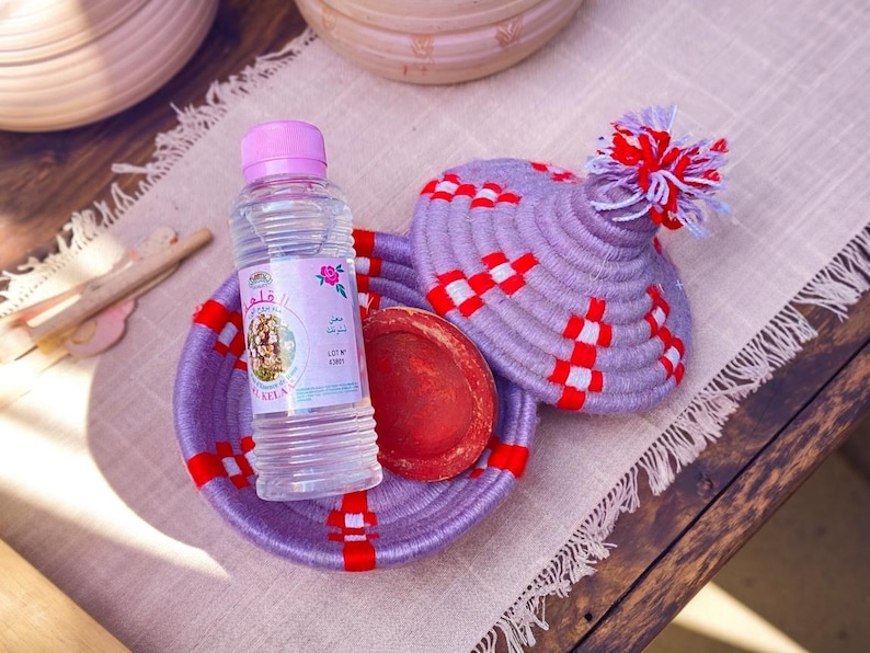 Moroccan Artisanal Set: Rosewater, Berber Lip Stain, & Handwoven Tajine-Inspired Storage Basket