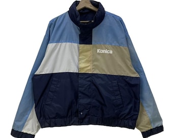 Chaqueta ligera vintage Konica Minolta reversible con bloques de color