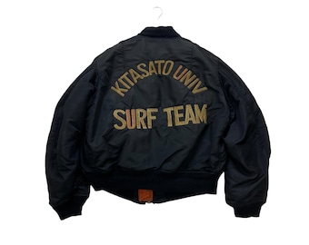 Chaqueta bomber Alpha Industries tipo MA1 con bordado de surf vintage de los años 80