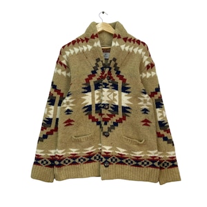 Diese Strickjacke von 'Urheber Sonny Label' mit Azteken-Muster im Navajo-Stil besticht mit Schalkragen