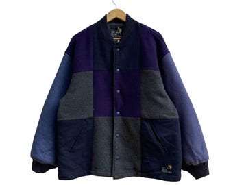 Chaqueta universitaria Go Slow Caravan con patchwork en bloques de color