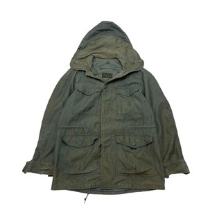 May include: A green hooded jacket with multiple pockets and a drawstring waist.