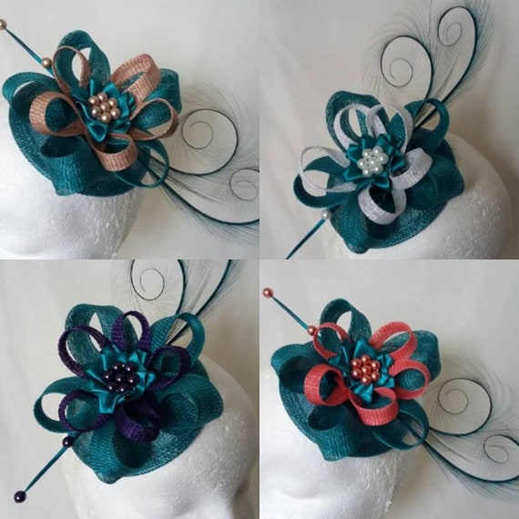 suitable for races, Green net and feather hair fascinator on a slim alice band