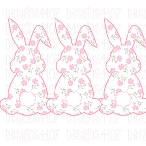 May include: Three pink bunny silhouettes with a floral pattern. The bunnies are facing forward with their ears up and their tails in the air.