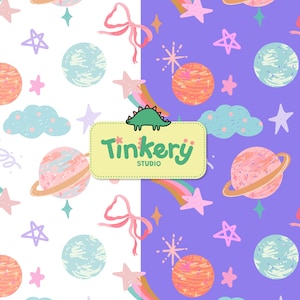 May include: A whimsical pattern featuring planets, stars, clouds, rainbows, and bows in pastel colors. The design includes the text "Tinkery Studio" with a green dinosaur illustration. The background is split between white and purple.