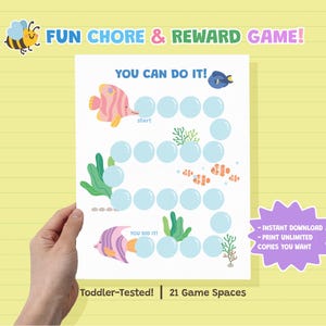 Op de afbeelding: Een taak- en beloningsspelbord met een onderwaterthema. Het bord toont een pad van bellen, visillustraties en de tekst "YOU CAN DO IT!" en "YOU DID IT!". Het spel is ontworpen voor peuters en heeft 21 spelruimtes.