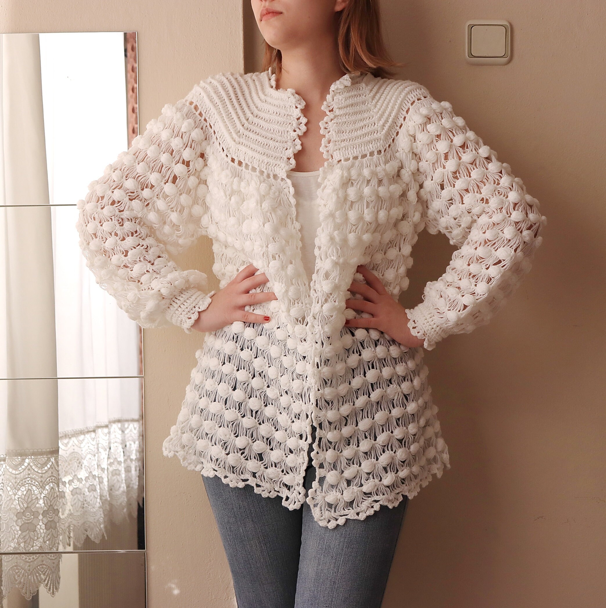 white knitted jacket