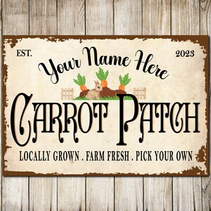 May include: A rustic wooden sign with the text "EST. Your Name Here 2023 CARROT PATCH LOCALLY GROWN. FARM FRESH. PICK YOUR OWN" and a cartoon image of a rabbit in a carrot patch.
