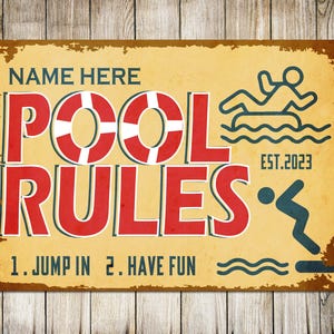 May include: A distressed-look sign with the words "POOL RULES" in red, featuring a life ring graphic. The sign includes the text "NAME HERE" at the top and "1. JUMP IN 2. HAVE FUN" at the bottom, with illustrations of people swimming. The sign is dated "EST. 2023".