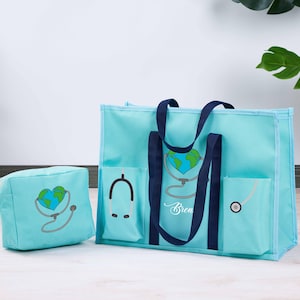 May include: A light blue tote bag and matching cosmetic bag. Both feature a heart-shaped Earth design with a stethoscope. The tote has navy blue handles and pockets. The cosmetic bag has a zipper closure. The word "Brea" is written on the tote.
