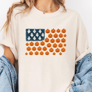 Camiseta de Halloween con bandera de colores cómodos, fantasma, calabaza, Jack-O-Lantern, patriótica, espeluznante, gráfica de EE. UU., camiseta de otoño, terror, estética espeluznante