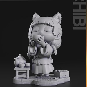 May include: A grey chibi figurine of a character with fox ears, holding a cup. A small table with a teapot and cups is beside the figure. The word "CHIBI" is printed vertically on the right. The image also has the words "nomnom Figures TURNTABLE".