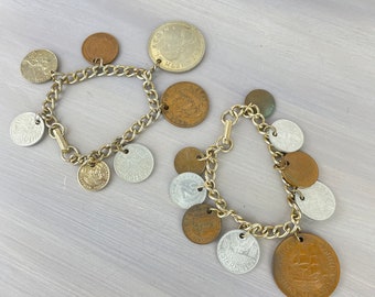 Vintage 1950s foreign coin charm bracelets on gold-tone metal chains - Pair