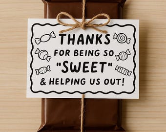 May include: A white card with black text and candy illustrations that reads "Thanks for being so "Sweet" & helping us out!" tied with twine to a brown chocolate bar.