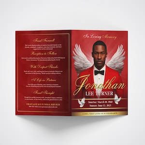 May include: A memorial card with a red and gold design. The card features a portrait of a man in a red suit with angel wings. The name "Jonathan Lee Turner" is displayed in gold script, along with dates and a quote.