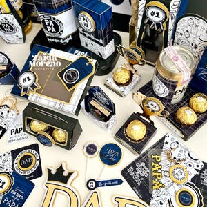 May include: A collection of Father's Day gifts, including boxes, tags, and decorative elements. The items feature blue and gold accents, with the word "DAD" prominently displayed. Some items include the text "I Love You Dad".