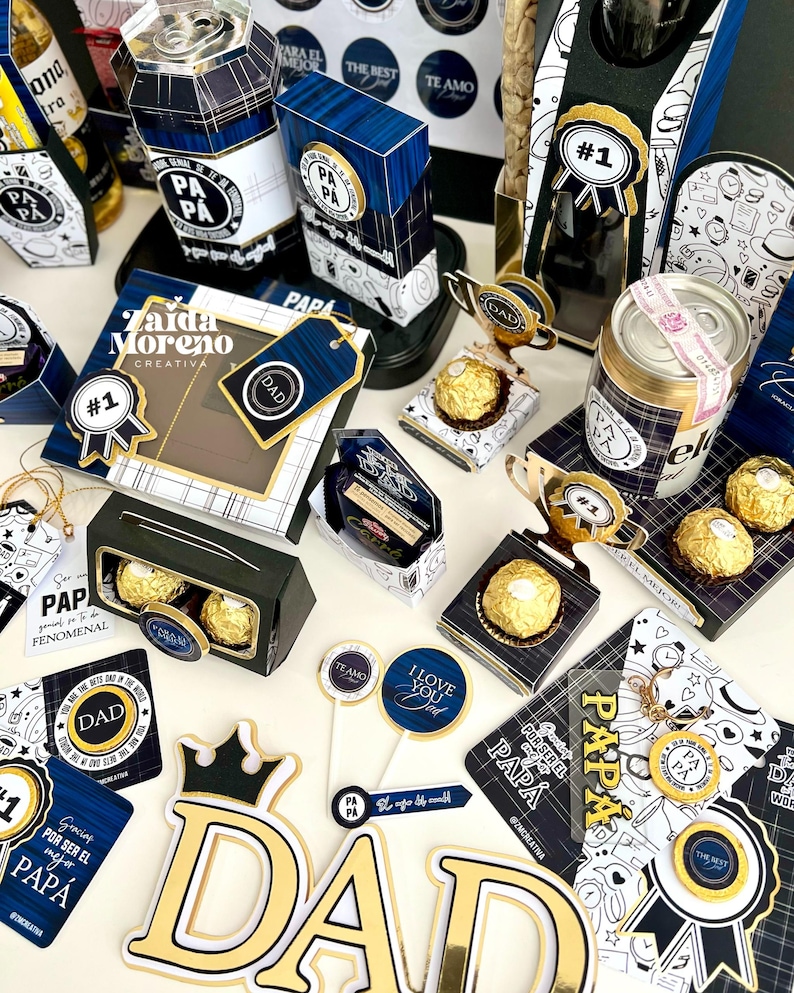 May include: A collection of Father's Day gifts, including boxes, tags, and decorative elements. The items feature blue and gold accents, with the word "DAD" prominently displayed. Some items include the text "I Love You Dad".