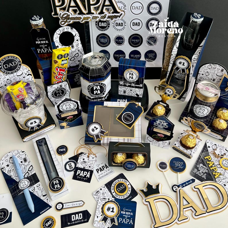 May include: A collection of Father's Day gifts and decorations. Includes gift boxes, tags, and toppers with "DAD" and "PAPA" text. The color scheme is navy blue, gold, and white, with various treats and small gifts.
