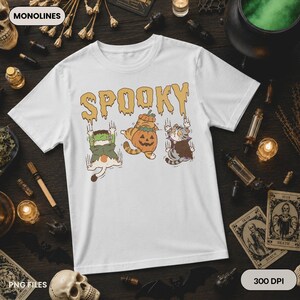 Funny Halloween cat PNG featuring pumpkin costume cat, vampire kitten and Frankenstein kitty beneath spooky dripping lettering for sublimation printing.