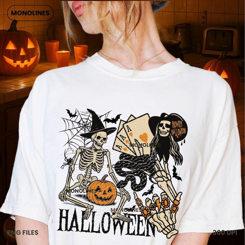 May include: Off-white Halloween-themed t-shirt featuring a graphic of two skeletons, a jack-o'-lantern, playing cards, and bats. The text "HALLOWEEN" is printed in large, bold letters at the bottom of the shirt. The design includes a spider web and a witch's hat.