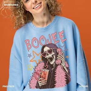 Pink coquette skeleton holding a drink and talking on a vintage telephone, trendy Halloween shirt graphic PNG