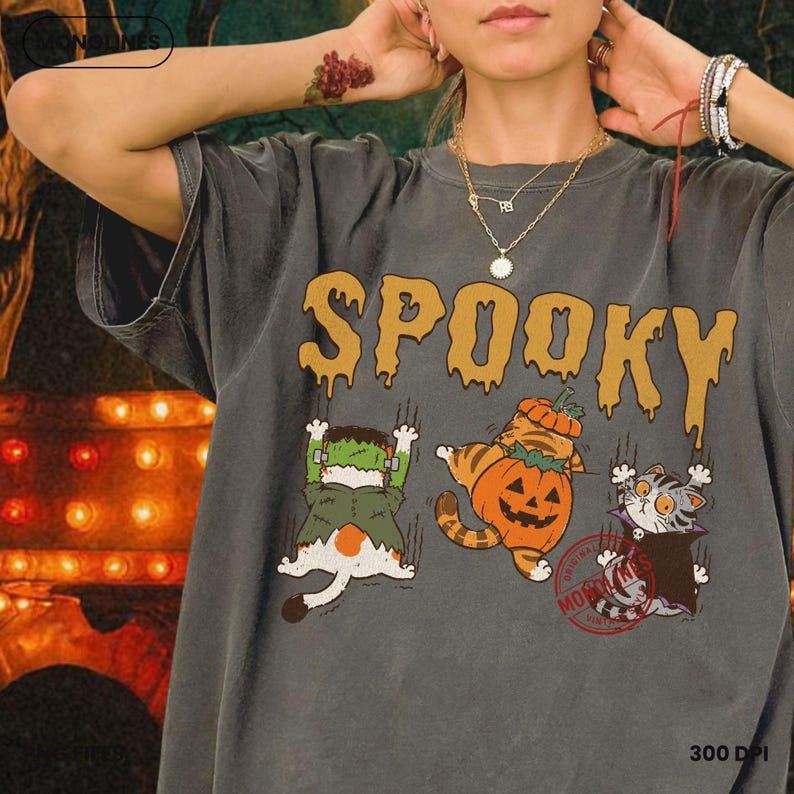 Funny cat Halloween PNG for sublimation featuring adorable spooky kittens with pumpkin vampire and Frankenstein costumes and dripping spooky lettering.