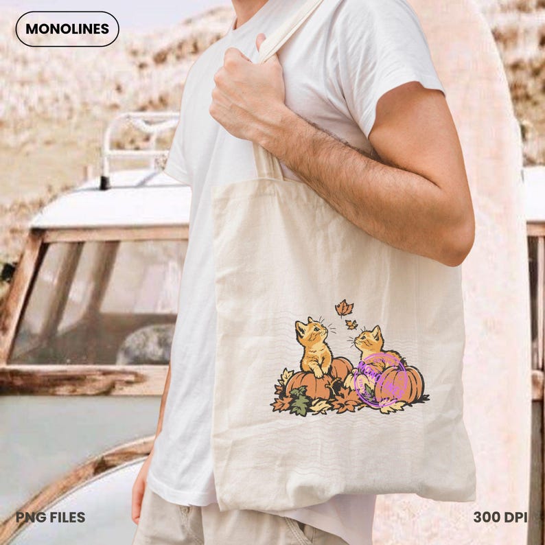 Cute autumn cat clipart with pumpkins and falling leaves designed for seasonal shirts, sweatshirts and DIY crafts.