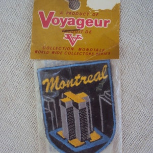 Vintage anni '60 Montreal CANADA Travel Patch Original Packaging Voyageur Emblem Company NOS