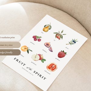 May include: A printable poster featuring watercolour illustrations of fruits representing the fruits of the spirit. The fruits are pear, pomegranate, berries, figs, juniper berries, strawberry, apple, and an orange. The text on the poster reads "FRUIT of the SPIRIT Galatians 5:22-23".