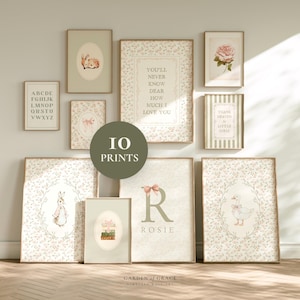May include: A selection of ten framed art prints with floral and animal illustrations. The prints feature a variety of designs, including a bunny, a goose, a rose, and text. The color palette includes soft greens, pinks, and beige.