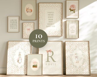 May include: A collection of ten framed art prints with floral and animal illustrations. The prints feature a variety of designs, including a bunny, a goose, a rose, and text. The color palette includes soft greens, pinks, and beige.